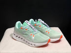 On Cloudsurfer Sneakers in Pale Green and White