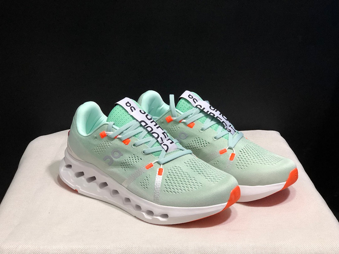 On Cloudsurfer Sneakers in Pale Green and White