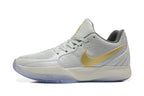 Nike Kyrie Low Basketball Shoes in Gray and Gold