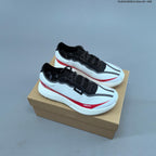 norda 005 Trail Running Shoes in White, Black and Red