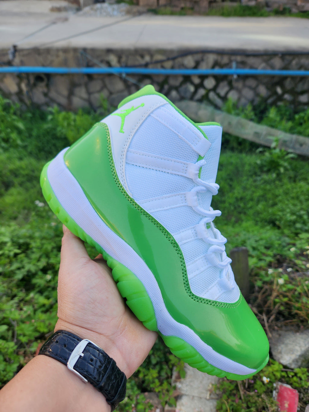 Jordan 11 White and Apple Green High-Top Sneakers