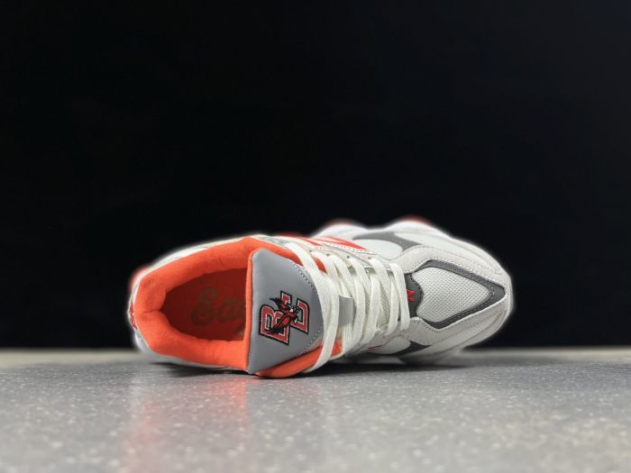 New Balance U9060EGL Sneakers in Grey and Coral