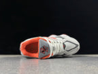 New Balance U9060EGL Sneakers in Grey and Coral