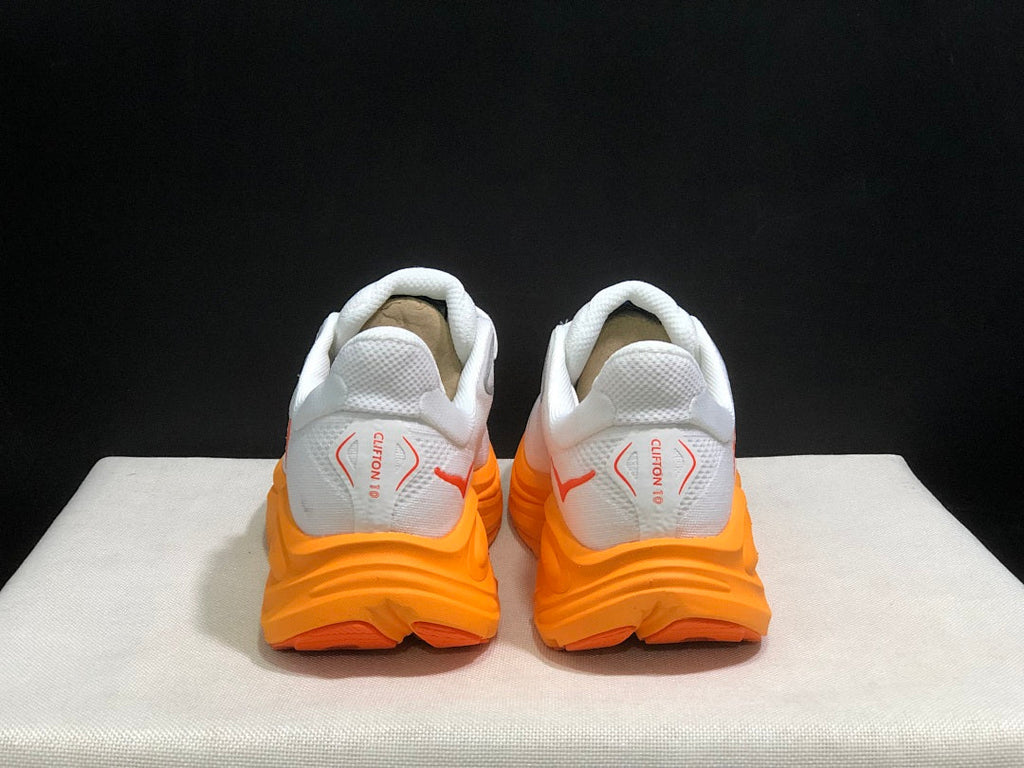 HOKA Clifton 10 Running Shoes in White and Orange