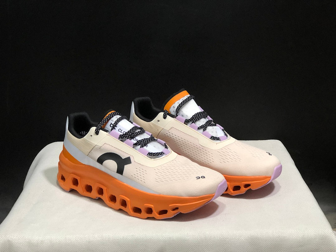 On Cloudmonster Running Shoes in Yellow Tan and Orange