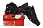 Nike Air Max Plus Sneakers in Black and Red