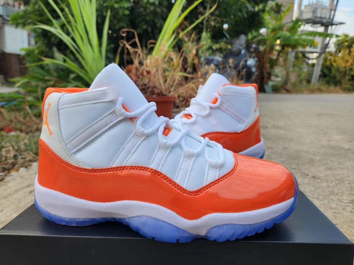 Jordan 11 White and Orange High-Top Sneakers
