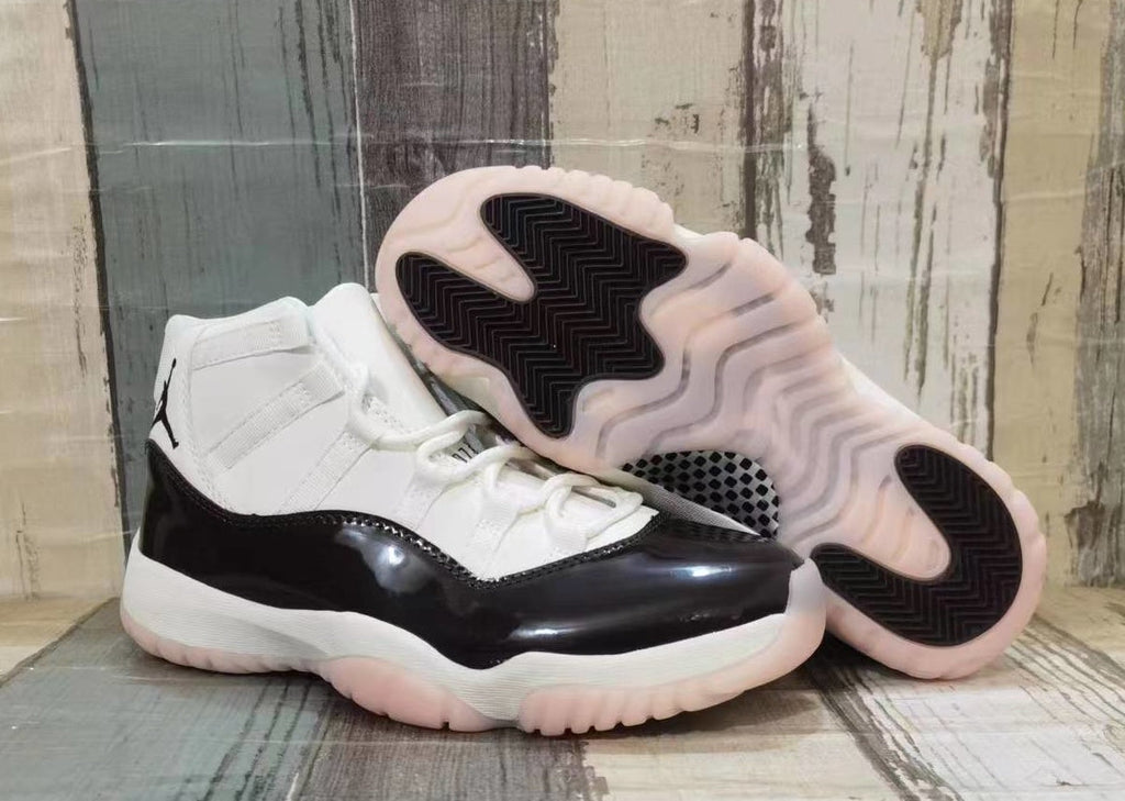 Jordan 11 High-Top Sneakers in White and Black