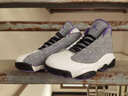 Jordan Air Jordan 13 Sneakers in Black, White and Purple