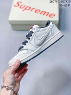 Jordan 1 Low White and Navy Sneakers