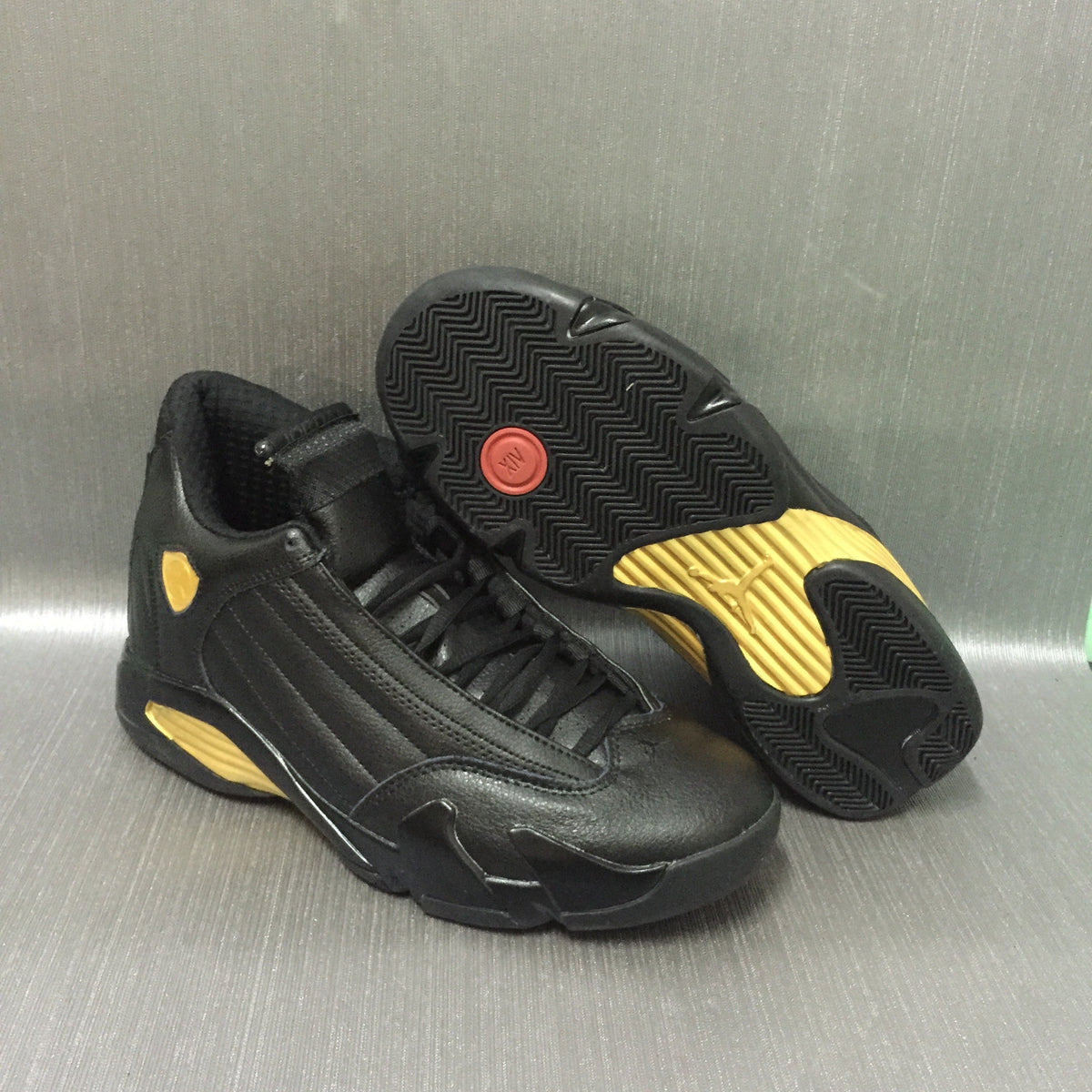 Jordan Air Jordan 14 Black and Gold High-Top Sneakers