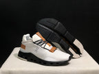 On Cloudnova Sneakers in White, Black and Tan