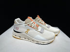 On Cloudnova 2 Sneakers in Ivory and Orange