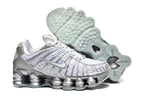 Nike Shox TL Sneakers in White and Metallic Silver