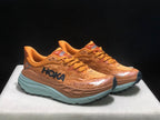 HOKA Stinson 7 Trail Running Shoes in Orange