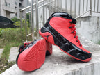 Jordan 9 High-Top Sneakers in Blue, White and Red