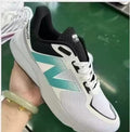 New Balance MFLSHBW Running Shoe in White and Teal