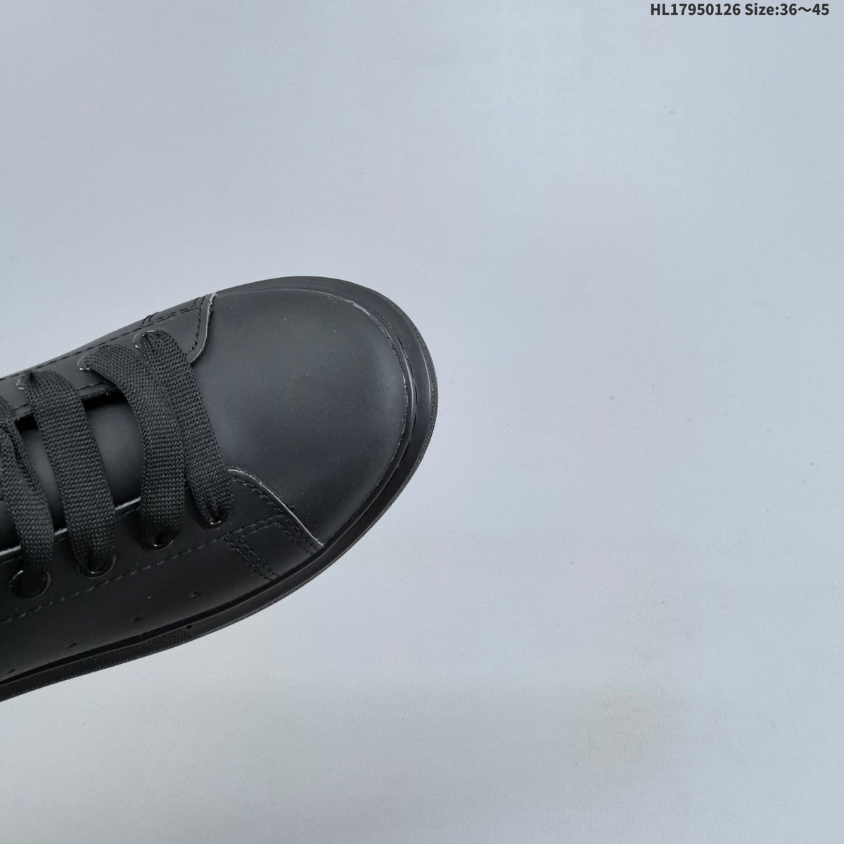 Alexander McQueen Low-Top Sneakers in Black with Thick Sole