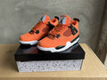 Jordan Air Jordan 4 Orange and Black Sneakers