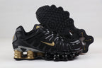 Nike Shox TL Sneakers in Black and Gold