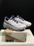 On Cloudmonster Sneakers in Gray and Purple