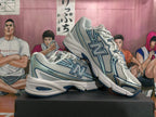 New Balance 740 White and Blue Sneakers