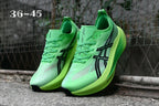 ASICS Green Running Shoes with Black Logo