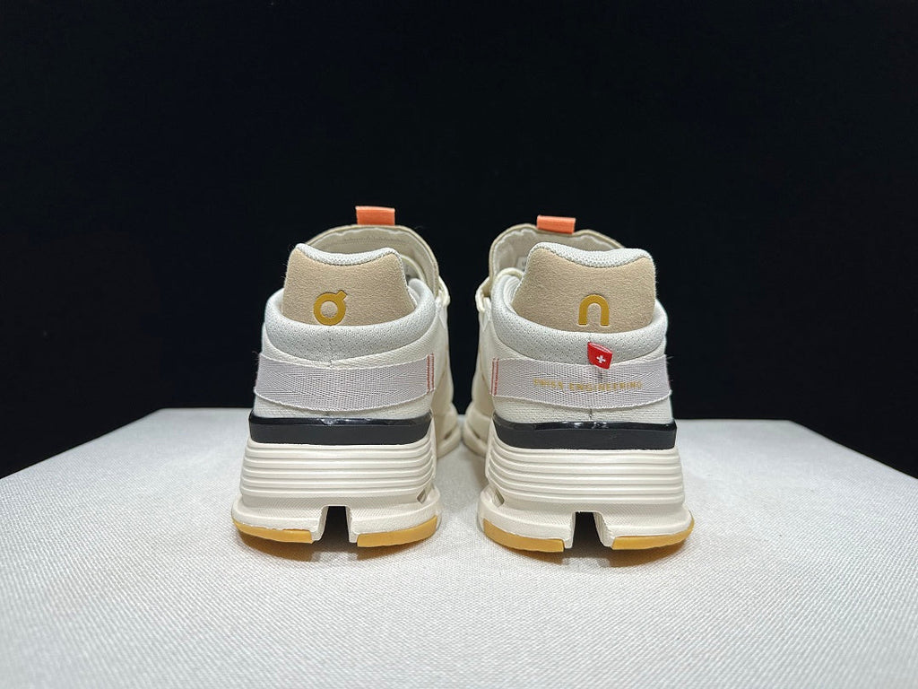 On Cloudnova 2 Sneakers in Ivory and Orange