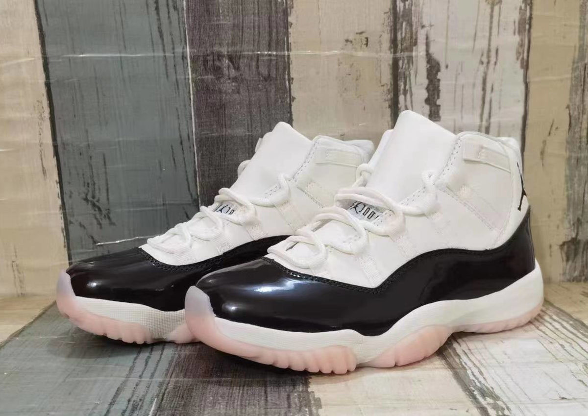 Jordan 11 High-Top Sneakers in White and Black
