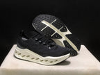 On Cloudsurfer Max Black and White Running Sneakers