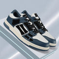 AMIRI Low-Top Sneakers in Navy, White and Black