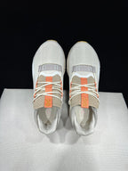 On Cloudnova 2 Sneakers in Ivory and Orange