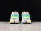 New Balance 9060DBT Sneakers in Teal and Green