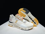 On Cloudnova 2 Sneakers in Ivory and Orange