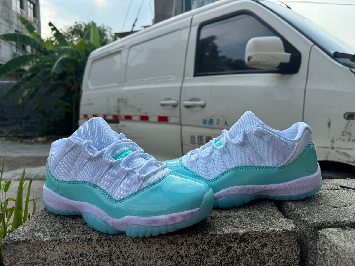 Jordan 11 Low White and Light Green Sneakers