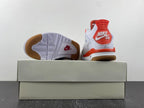 Nike SB x Air Jordan 4 White and Orange Sneakers DR5415-108