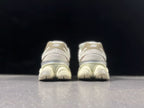 New Balance 9060 Sneakers in Cream and Lavender
