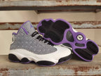Jordan Air Jordan 13 Sneakers in Black, White and Purple
