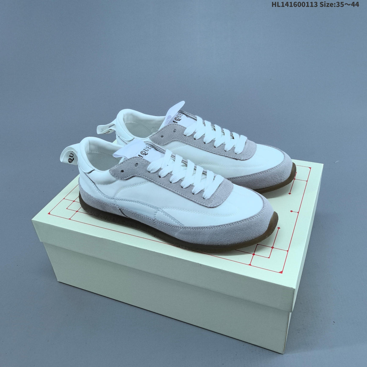 Miu Miu Tyre Low-Top Sneakers in Black or White