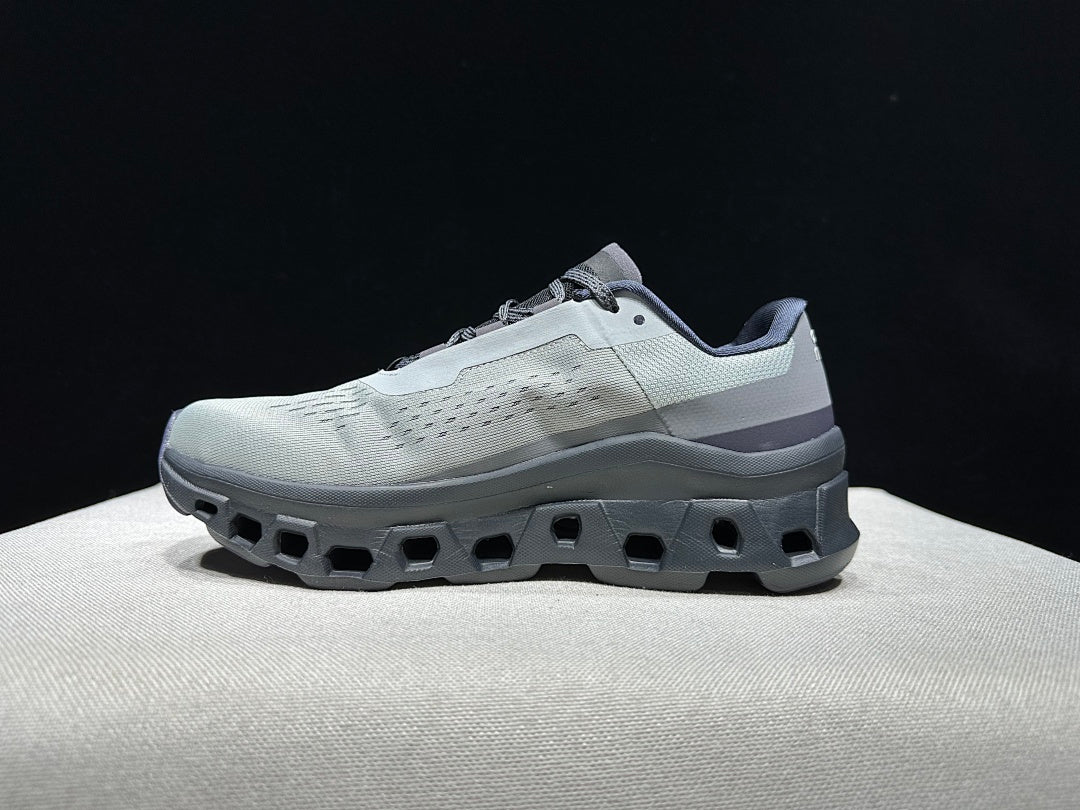 On Cloudmonster Running Shoes in Eclipse and Magnet