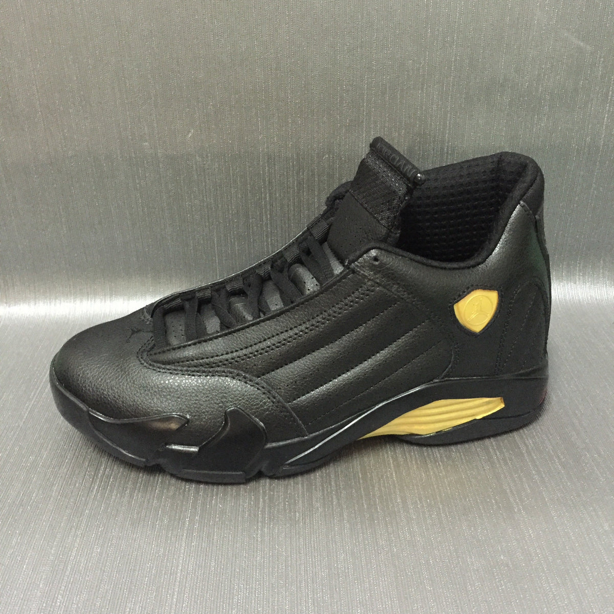 Jordan Air Jordan 14 Black and Gold High-Top Sneakers