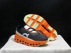 On Cloudmonster Running Shoes Black Orange