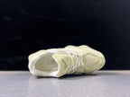 New Balance 9060EEN Sneakers in Pale Yellow and Gray