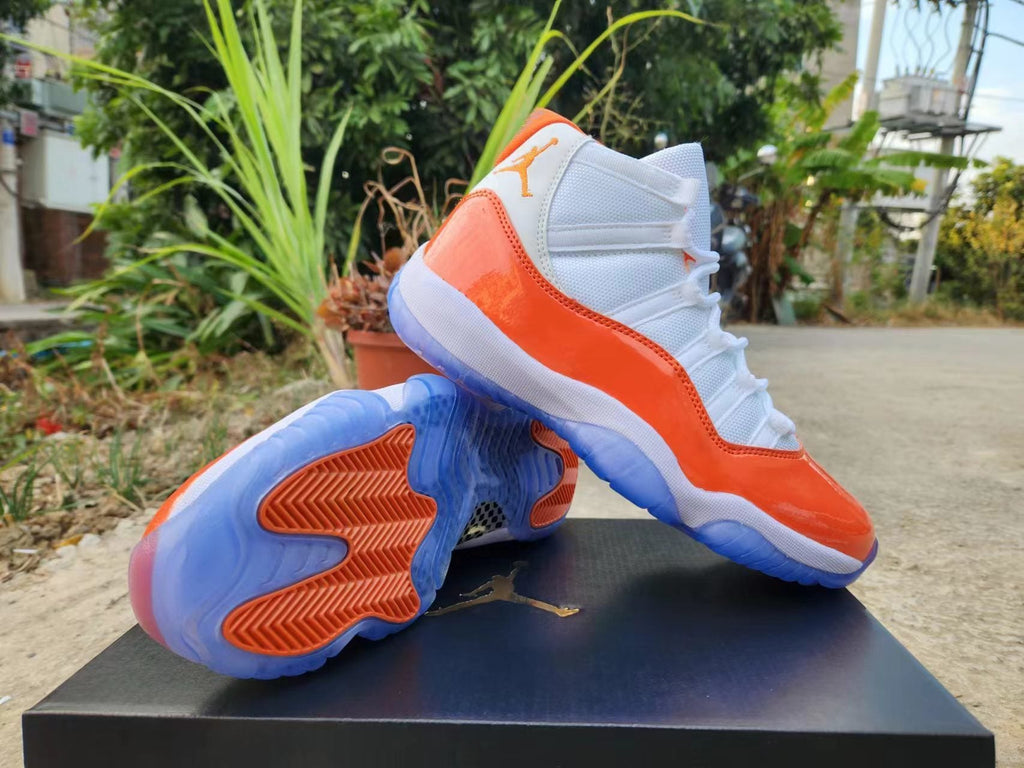 Jordan 11 White and Orange High-Top Sneakers