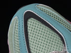 New Balance 9060 WRB Sneakers in Mint and Pink