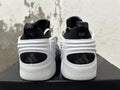 White and Black Sculpted High-Top Sneakers