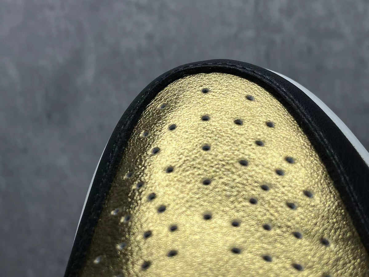 Jordan 1 High Black and Gold Sneakers