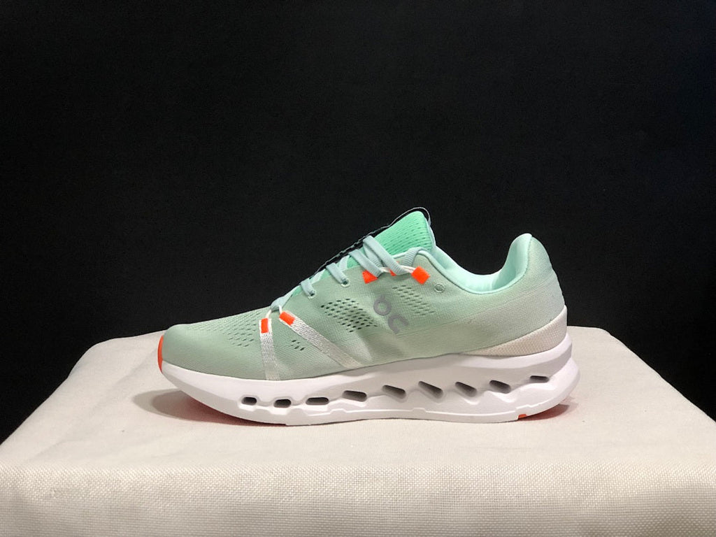 On Cloudsurfer Sneakers in Pale Green and White