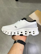 On Running White and Black Running Shoes