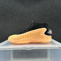 Black and Orange High-Top Sneakers